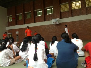 Students listening to a lesson on screening to help your teammate.