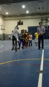 Ram working with his students during Crossover 2013 Hoops Creating Hope
